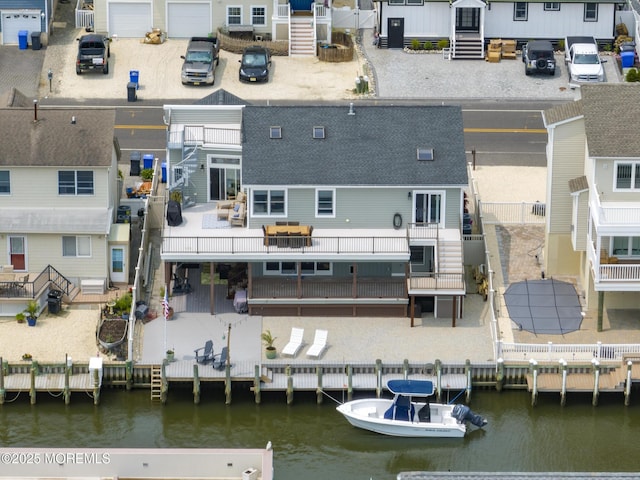 1498 Paul Blvd, Manahawkin, NJ 08050 - aerial perspective of suburban area featuring a large body of water