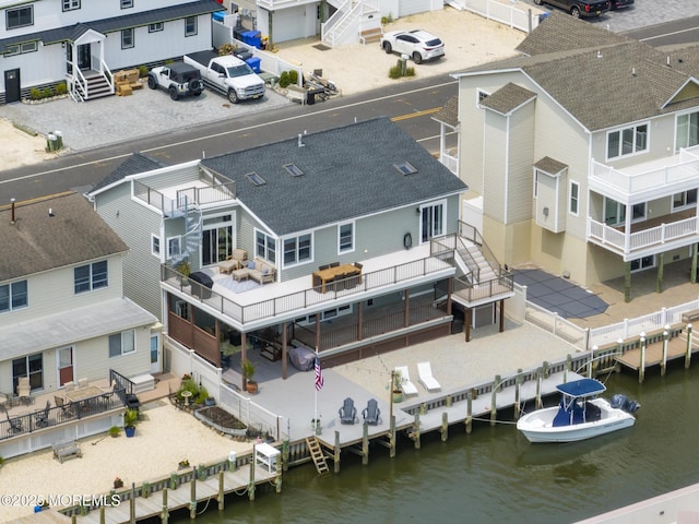 1498 Paul Blvd, Manahawkin, NJ 08050 - aerial perspective of suburban area with a large body of water