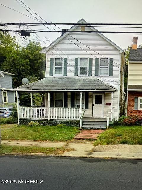 view of front of home featuring covered porch