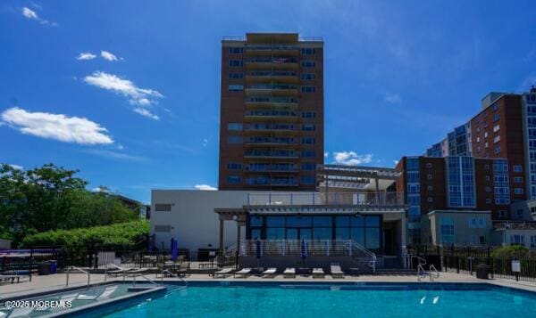 28 Riverside Ave Unit 9G, Red Bank, NJ 07701 - community pool with a patio