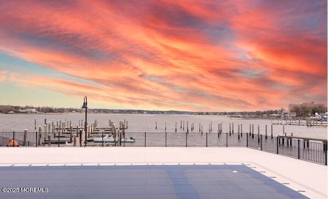 28 Riverside Ave Unit 9G, Red Bank, NJ 07701 - pool at dusk with a water view