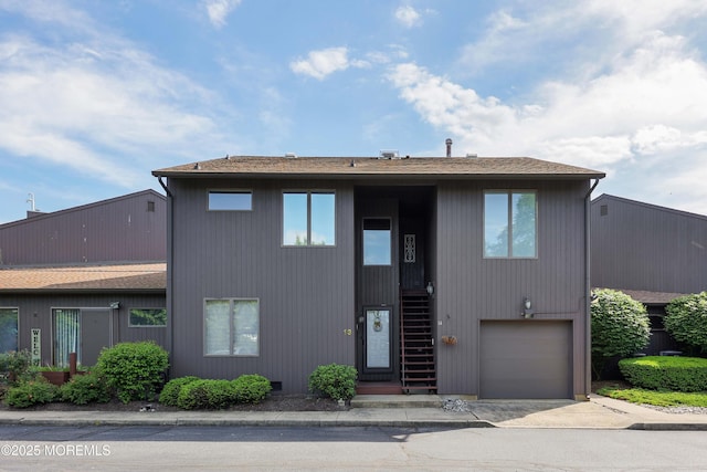 14 Sea Point Dr, Point Pleasant, NJ 08742 - view of front facade with a garage, roof with shingles, and driveway