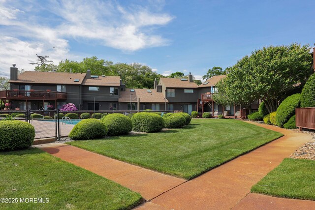 14 Sea Point Dr, Point Pleasant, NJ 08742 - view of community with a residential view, stairway, a gate, and a wooden deck