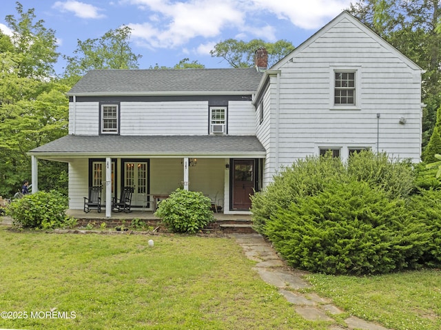341 Chapel Hill Rd, Atlantic Highlands, NJ 07716 - view of front of home featuring a front lawn, a chimney, a porch, cooling unit, and roof with shingles