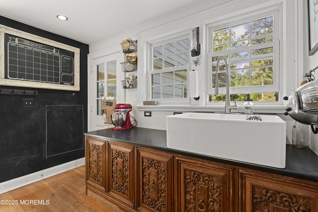 341 Chapel Hill Rd, Atlantic Highlands, NJ 07716 - kitchen with wood finished floors, a sink, recessed lighting, and dark countertops