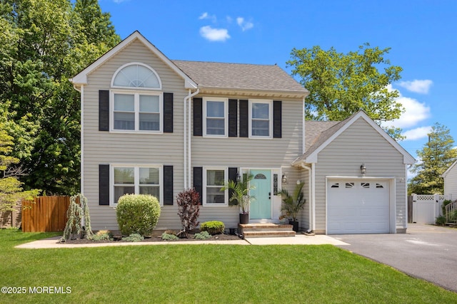 33 Red Maple Dr, Brick, NJ 08724 - view of front of house featuring asphalt driveway, an attached garage, and roof with shingles