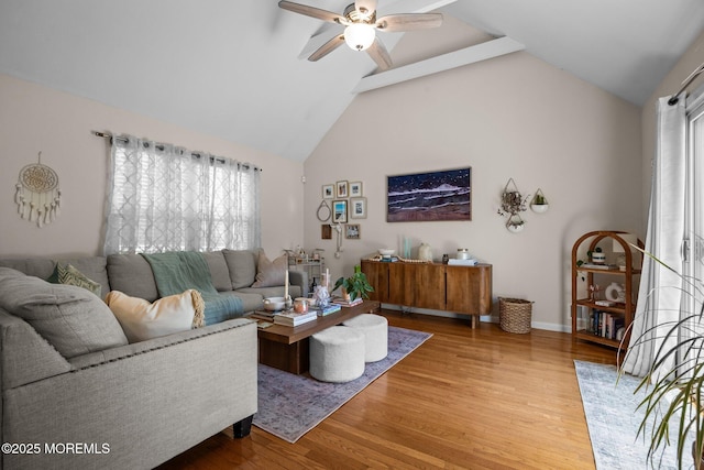 33 Red Maple Dr, Brick, NJ 08724 - living area featuring a ceiling fan, healthy amount of natural light, wood finished floors, beam ceiling, and high vaulted ceiling