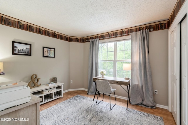 81 W Shenendoah Rd, Howell, NJ 07731 - home office with a textured ceiling, wood finished floors, and baseboards