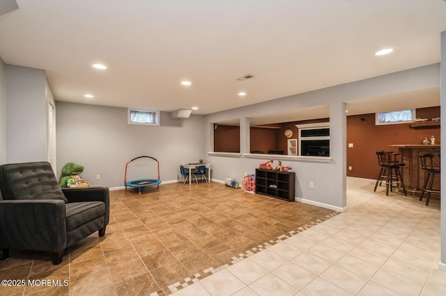 81 W Shenendoah Rd, Howell, NJ 07731 - sitting room with recessed lighting, plenty of natural light, baseboards, and bar area