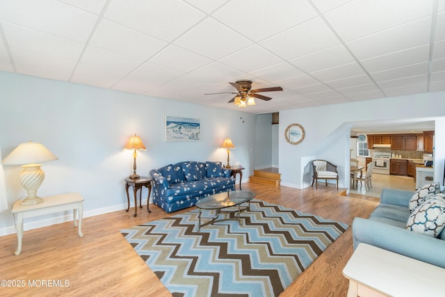 2203 Grand Central Ave Unit B, Lavallette, NJ 08735 - living area with a ceiling fan, light wood-style flooring, baseboards, and a paneled ceiling