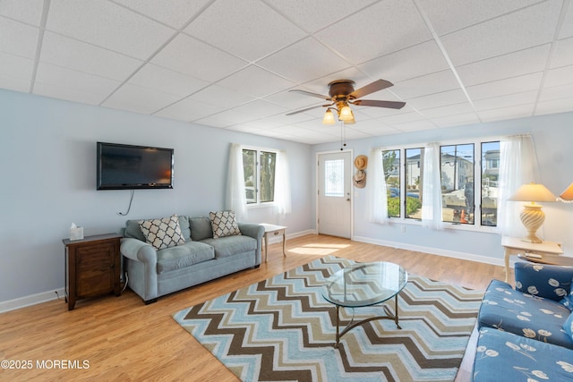 2203 Grand Central Ave Unit B, Lavallette, NJ 08735 - living room with ceiling fan, a drop ceiling, wood finished floors, and baseboards