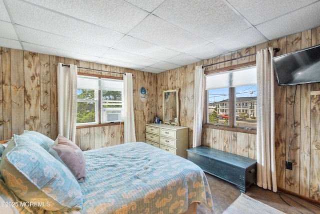 2203 Grand Central Ave Unit B, Lavallette, NJ 08735 - bedroom with wooden walls, a paneled ceiling, and carpet flooring