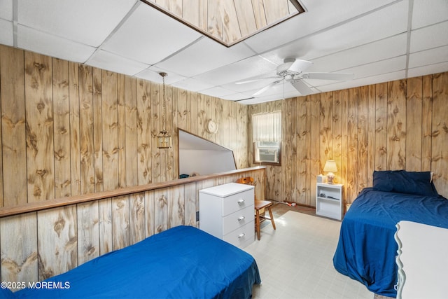 2203 Grand Central Ave Unit B, Lavallette, NJ 08735 - carpeted bedroom featuring a drop ceiling, wooden walls, a ceiling fan, and cooling unit