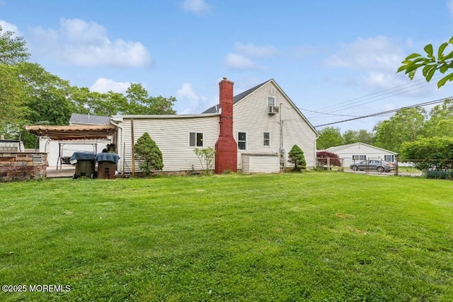 110 W 4th St, Howell, NJ 07731 - rear view of house featuring a chimney