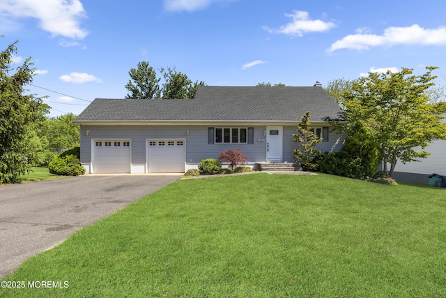 18 Hampton Rd, Howell, NJ 07731 - view of front of home with asphalt driveway, a garage, a front yard, and roof with shingles