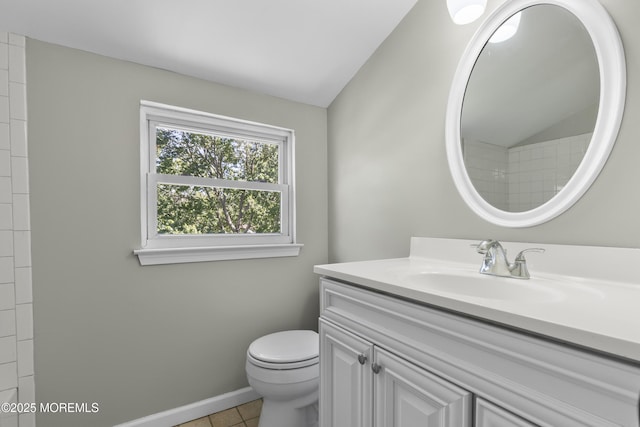 18 Hampton Rd, Howell, NJ 07731 - bathroom with toilet, tile patterned floors, vanity, baseboards, and lofted ceiling