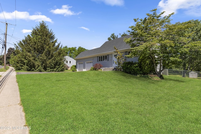 18 Hampton Rd, Howell, NJ 07731 - view of yard with a garage
