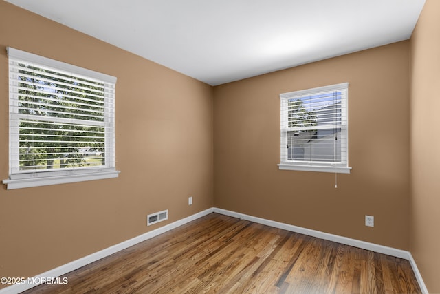 18 Hampton Rd, Howell, NJ 07731 - spare room featuring baseboards and wood finished floors