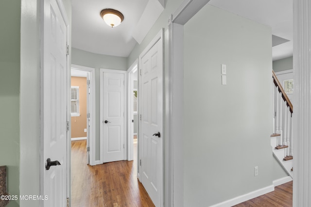 18 Hampton Rd, Howell, NJ 07731 - hall featuring wood finished floors, baseboards, and stairway