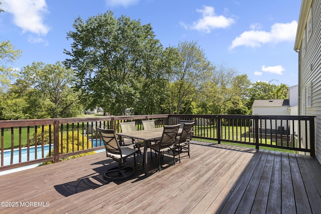 18 Hampton Rd, Howell, NJ 07731 - deck with outdoor dining area and view of scattered trees