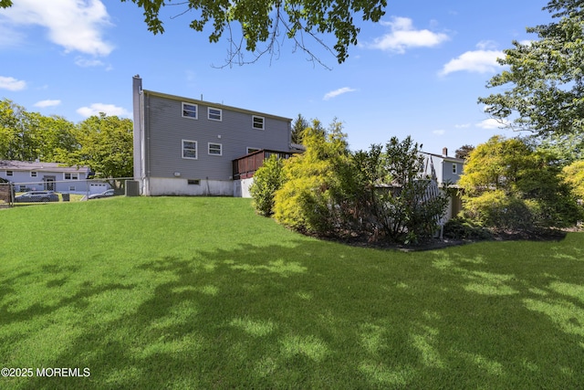 18 Hampton Rd, Howell, NJ 07731 - back of house with a chimney and cooling unit