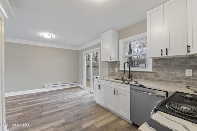 2A Primrose Ln, Jackson, NJ 08527 - kitchen with a baseboard radiator, stainless steel dishwasher, a sink, ornamental molding, and backsplash