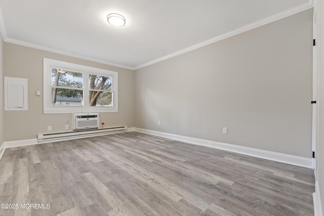 2A Primrose Ln, Jackson, NJ 08527 - spare room featuring a baseboard heating unit, ornamental molding, wood finished floors, baseboards, and an AC wall unit