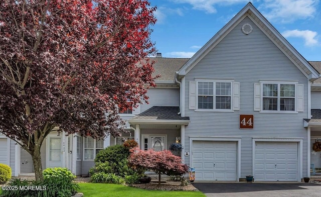 4403 Galloping Hill Ln, Toms River, NJ 08755 - view of front of home featuring a garage, a shingled roof, and driveway