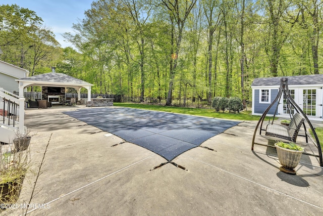 25 Briar Hill Dr, Manalapan, NJ 07726 - view of swimming pool featuring a gazebo, an outdoor structure, and a patio