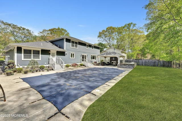 25 Briar Hill Dr, Manalapan, NJ 07726 - rear view of house featuring a gazebo, a patio area, a shingled roof, and concrete driveway