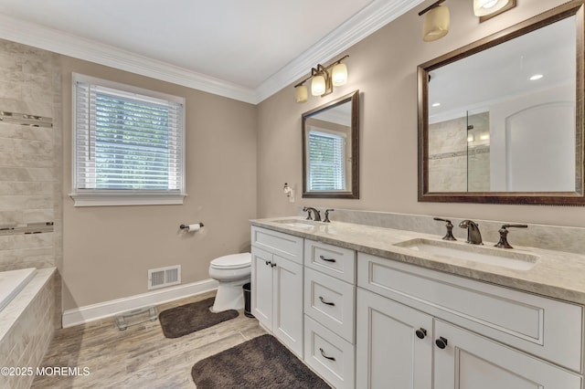 25 Briar Hill Dr, Manalapan, NJ 07726 - full bath with double vanity, toilet, crown molding, tiled shower, and wood finished floors