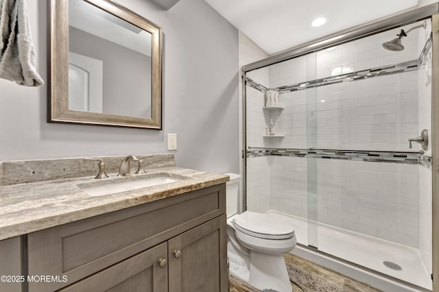 25 Briar Hill Dr, Manalapan, NJ 07726 - bathroom featuring vanity, a stall shower, toilet, and recessed lighting