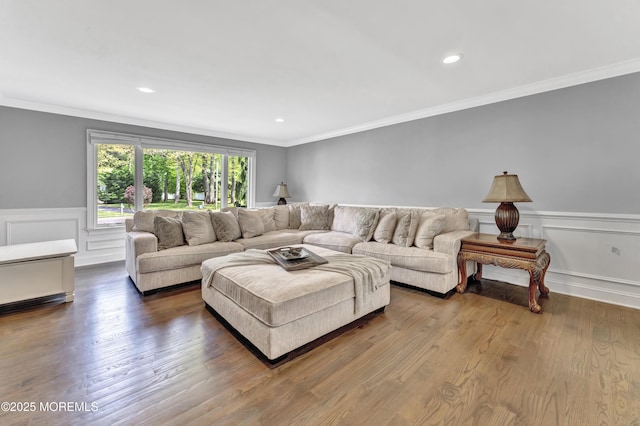 25 Briar Hill Dr, Manalapan, NJ 07726 - living room featuring a wainscoted wall, crown molding, wood finished floors, recessed lighting, and a decorative wall