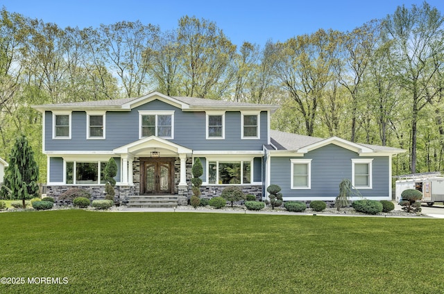 25 Briar Hill Dr, Manalapan, NJ 07726 - view of front of home with a front lawn and stone siding