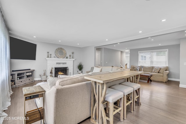 25 Glenview Rd, North Caldwell, NJ 07006 - living room featuring a fireplace, recessed lighting, wood finished floors, and baseboards