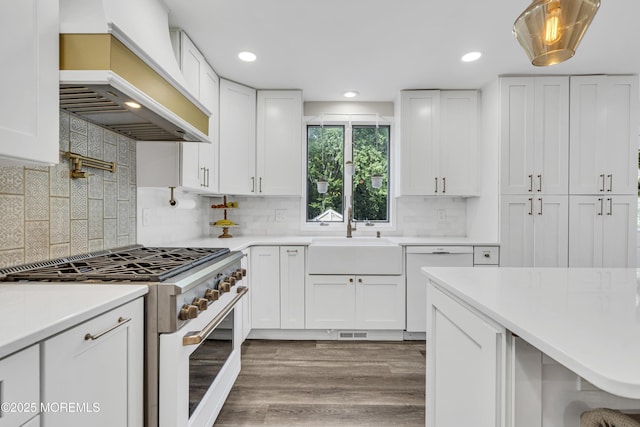 25 Glenview Rd, North Caldwell, NJ 07006 - kitchen with white appliances, custom exhaust hood, a sink, white cabinetry, and recessed lighting