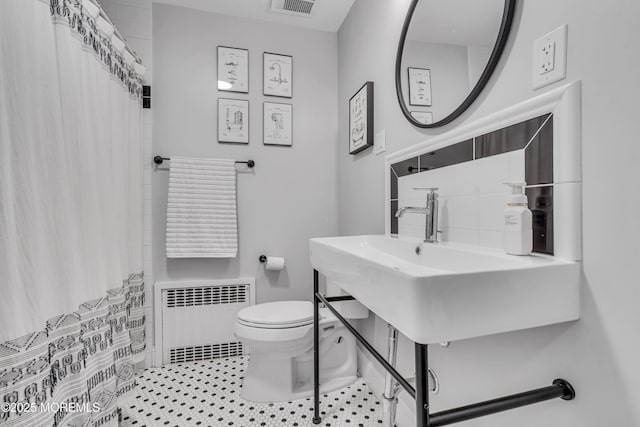25 Glenview Rd, North Caldwell, NJ 07006 - bathroom featuring radiator, toilet, a sink, and a shower with curtain