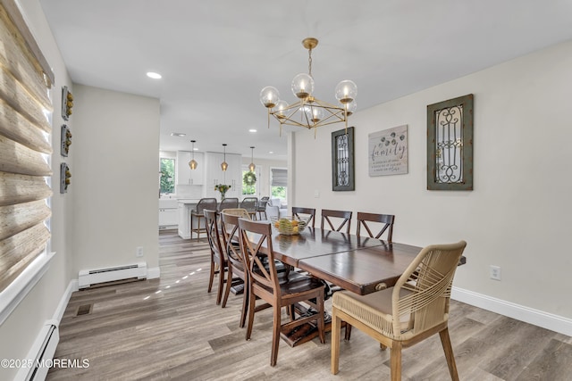 25 Glenview Rd, North Caldwell, NJ 07006 - dining area featuring baseboard heating, a baseboard heating unit, light wood-style floors, recessed lighting, and a chandelier