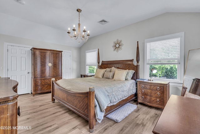 25 Glenview Rd, North Caldwell, NJ 07006 - bedroom with lofted ceiling, a chandelier, and light wood-style flooring