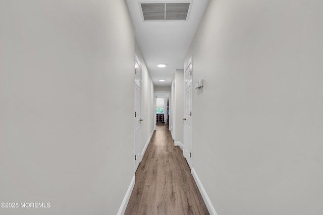 25 Glenview Rd, North Caldwell, NJ 07006 - hall with light wood-style floors, baseboards, and recessed lighting