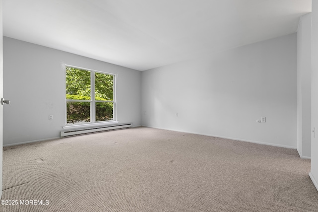 731A Chatham Ln, Manchester, NJ 08759 - empty room featuring a baseboard heating unit, carpet, and baseboards