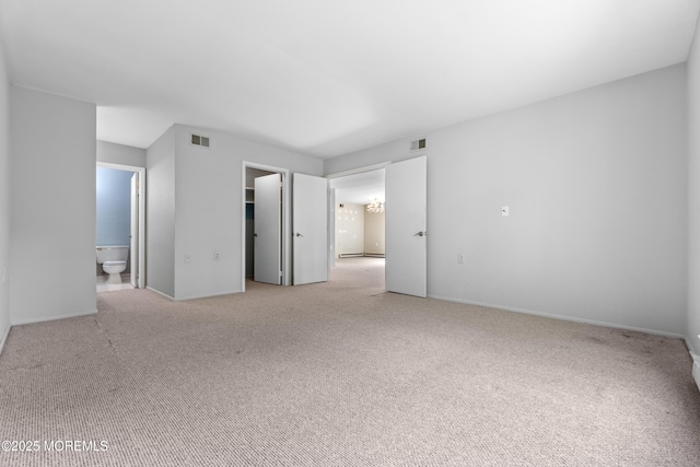 731A Chatham Ln, Manchester, NJ 08759 - unfurnished bedroom with carpet floors, a walk in closet, and baseboards