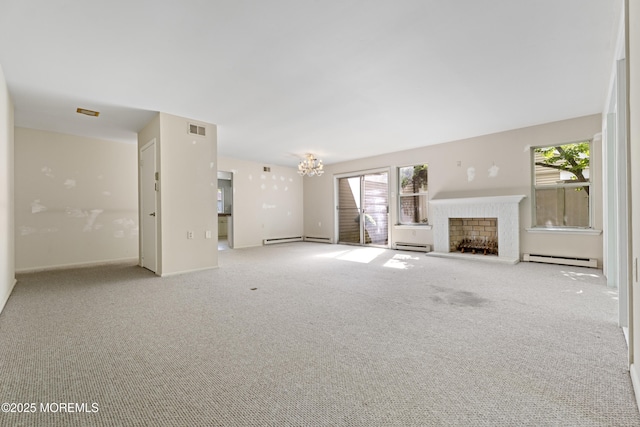 731A Chatham Ln, Manchester, NJ 08759 - unfurnished living room with baseboard heating, a fireplace with raised hearth, a baseboard heating unit, carpet, and healthy amount of natural light