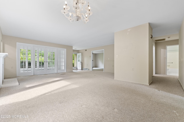 731A Chatham Ln, Manchester, NJ 08759 - unfurnished living room with carpet, a chandelier, and baseboards