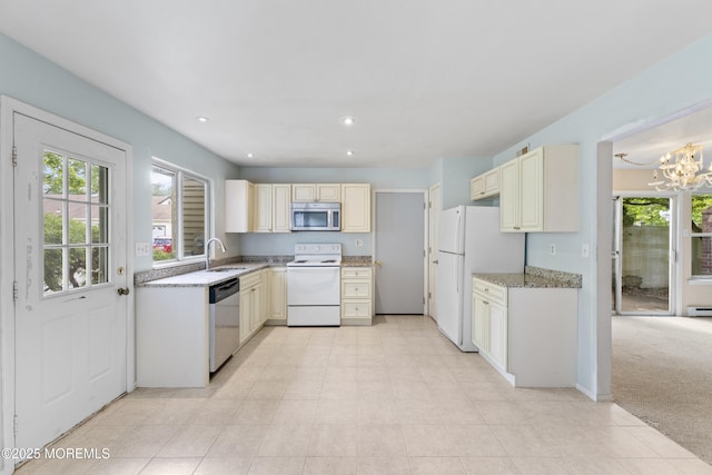 731A Chatham Ln, Manchester, NJ 08759 - kitchen featuring stainless steel appliances, plenty of natural light, a chandelier, cream cabinets, and recessed lighting