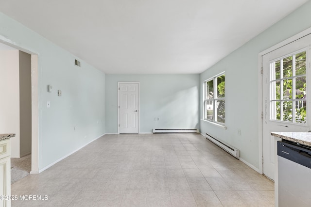 731A Chatham Ln, Manchester, NJ 08759 - unfurnished living room with a baseboard heating unit and baseboards