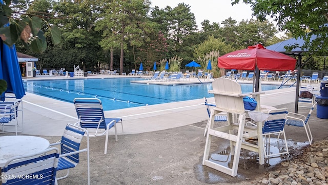 731A Chatham Ln, Manchester, NJ 08759 - community pool featuring a patio and view of wooded area