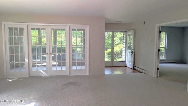 731A Chatham Ln, Manchester, NJ 08759 - doorway to outside with baseboard heating, french doors, and carpet flooring