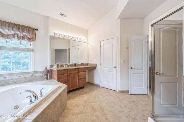 5 Duke Dr, Howell, NJ 07731 - bathroom featuring vanity, a bath, and tile patterned flooring