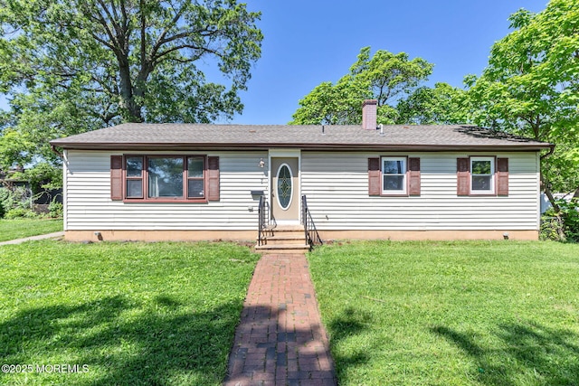7 Beechwood Ave, Keansburg, NJ 07734 - ranch-style house featuring a front yard and a chimney